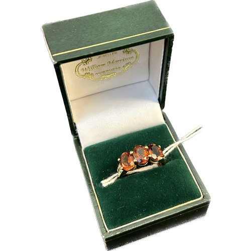 30 - 9ct yellow gold ring set with three Madeira Citrine stones-3.41cts flanked by diamond shoulders 0.16... 