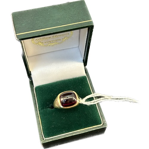 560 - 9ct yellow gold ring set with a ruby stone. Dome form. [4.21Grams] [Ring size O]