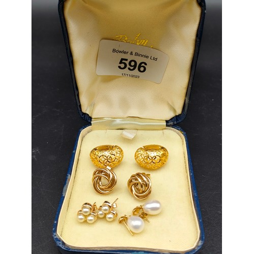 596 - Four pairs of gold earrings; Ornate pair of 18ct yellow gold earrings, Two pairs of 9ct yellow gold ... 