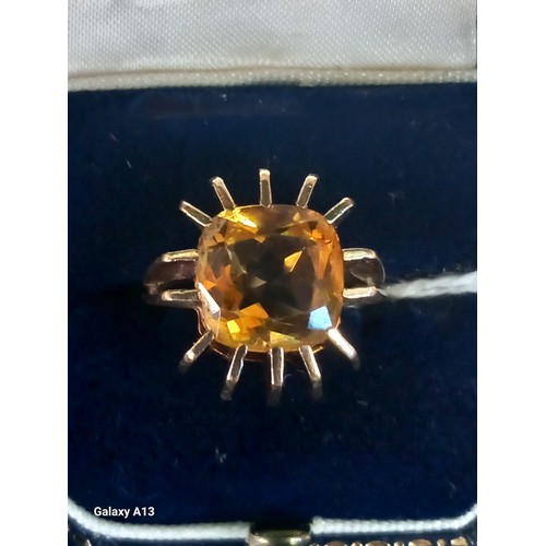 548 - 9ct yellow gold ring set with a multi claw set cushion cut citrine stone. [Ring size L] [8.70Grams]