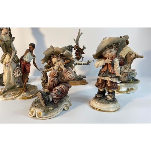 154 - A collection of Capodimonte figures & art nouveau design figural table lamp