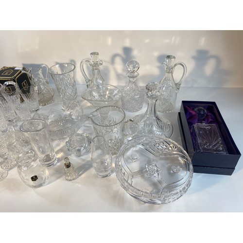 372 - A collection of crystal ware; Edinburgh crystal decanter, etched glass farmer scene vases dated 1978... 