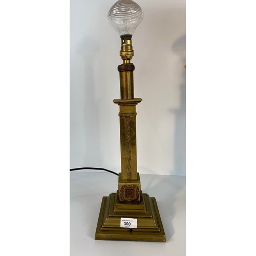 300 - A brass Corinthian column arts and crafts table with telescope attachment lamp along with brass tabl... 