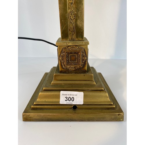 300 - A brass Corinthian column arts and crafts table with telescope attachment lamp along with brass tabl... 