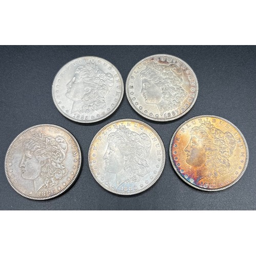 120 - A lot of five Silver Morgan One Dollar Coins. 1880, 1885, 1886 & two 1887.