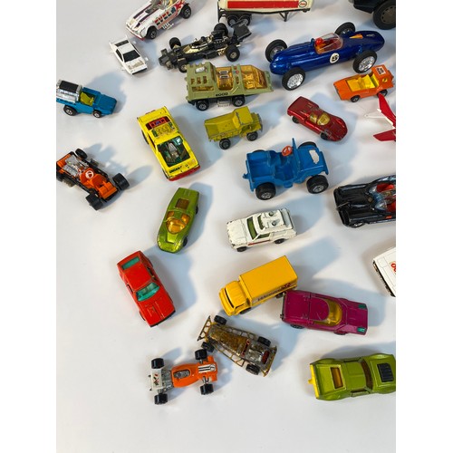 352 - A collection of play worn vehicle's; A Large tin plate police car, Corgi 007 Lotus, 1960s Corgi Batm... 