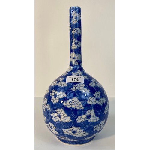 178 - A Chinese bottle Neck blue and white vase in flower design [30cm]