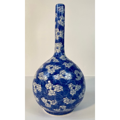 178 - A Chinese bottle Neck blue and white vase in flower design [30cm]