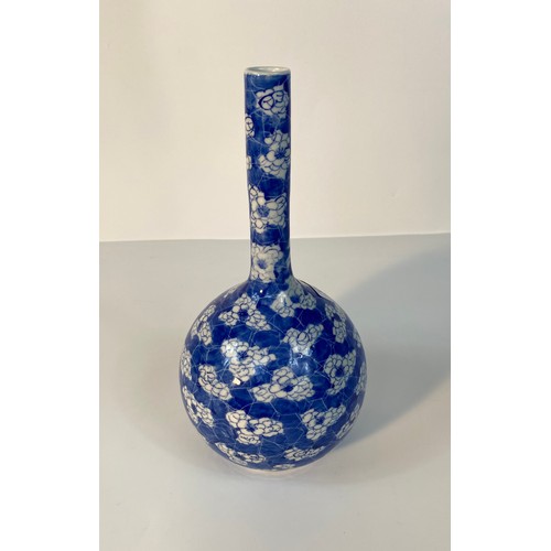 178 - A Chinese bottle Neck blue and white vase in flower design [30cm]