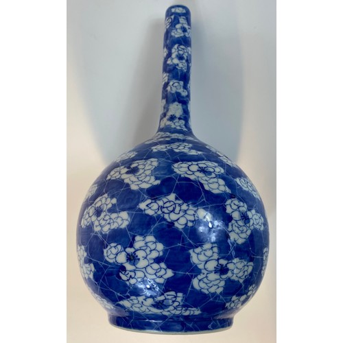 178 - A Chinese bottle Neck blue and white vase in flower design [30cm]