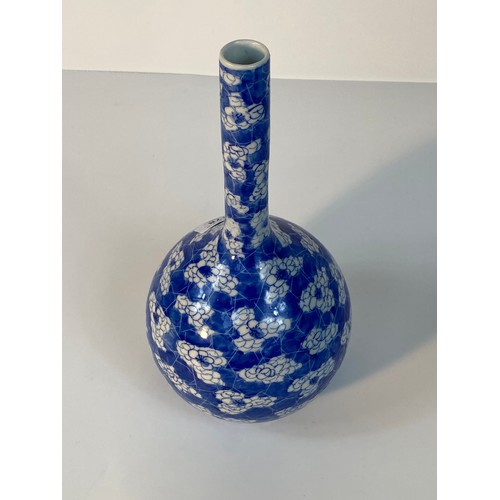 178 - A Chinese bottle Neck blue and white vase in flower design [30cm]