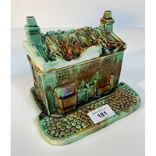 181 - A 19th century majolica drip glaze house with lidded roof top design [18x14cm]