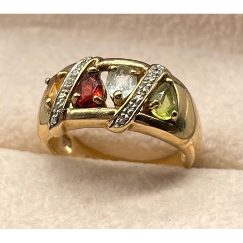 114 - 9ct yellow gold and multi gem stone ring. Diamond, garnet, topaz and citrine. [Ring size M] [3.87Gra... 