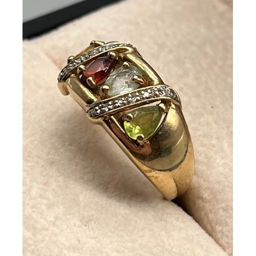 114 - 9ct yellow gold and multi gem stone ring. Diamond, garnet, topaz and citrine. [Ring size M] [3.87Gra... 