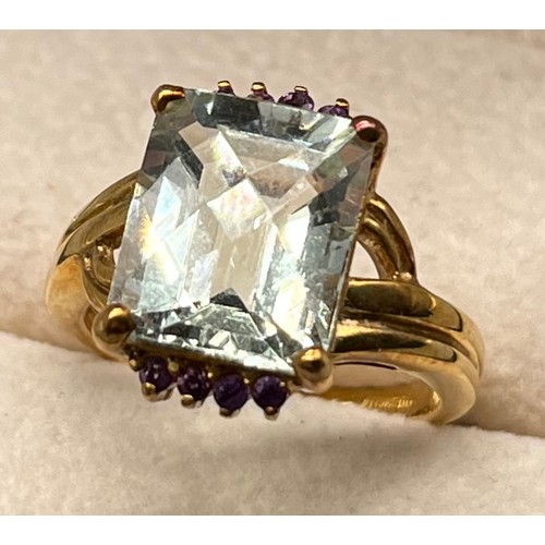 34 - 9ct yellow gold ring set with various gem stones. [Ring size N] [5.15Grams]