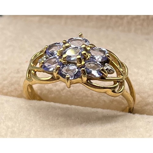 58 - 9ct yellow gold ring set with various pale purple gem stones [Ring size Q] [2.19Grams]