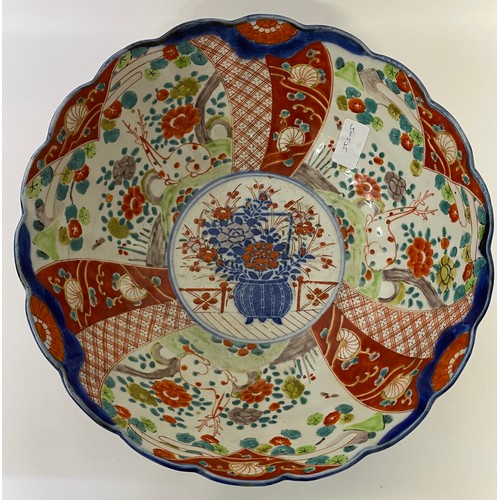 410 - An antique Japanese imari pattern large bowl along with vase [31cm bowl diameter]