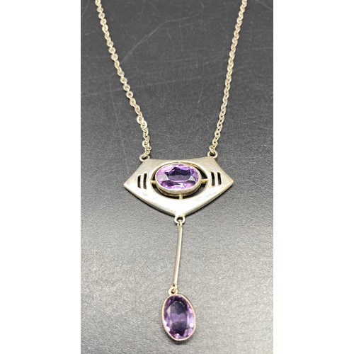 101 - Art Nouveau Chester silver pendant with a fitted silver necklace, pendant has an amethyst fitted wit... 