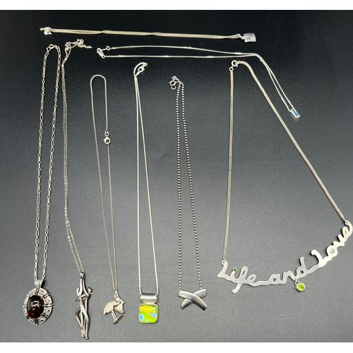 57 - A Selection of silver 925 necklaces and pendants; silver Modernist couple necklace, Murano silver pe... 