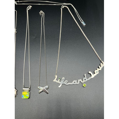 57 - A Selection of silver 925 necklaces and pendants; silver Modernist couple necklace, Murano silver pe... 