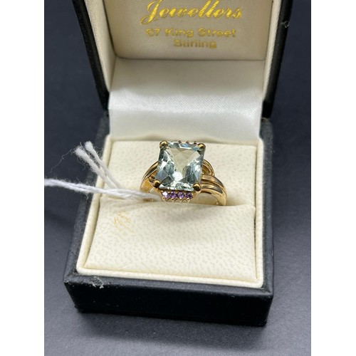 107 - 9ct yellow gold ring set with various gem stones. [Ring size N] [4.78grams]