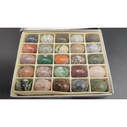 47 - A Collection of Gemstone eggs in fitted display box