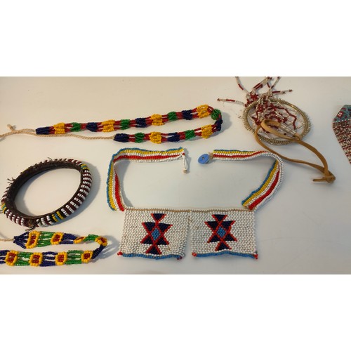 53 - A collection of African tribal beaded work jewellery