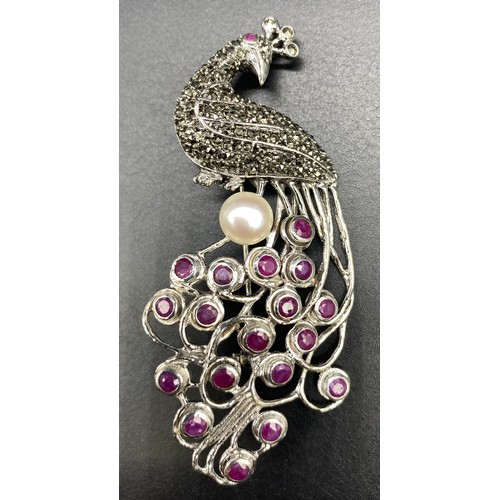 57 - Silver Marcasite & Ruby set Peacock brooch