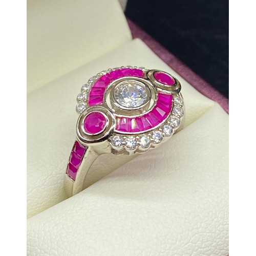 56 - A Silver CZ & Rubellite Art Deco Ring [Size O]