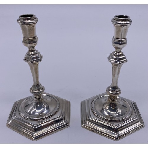 12 - A pair of cast silver George II style tapersticks
Spink & Sons, London 1968, the stem of
hexagon... 