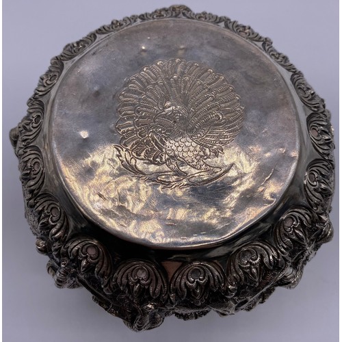 24 - A mid-19 th century Burmese silver bowl
Unmarked, all-over decoration of band of
figures
Diameter: 1... 