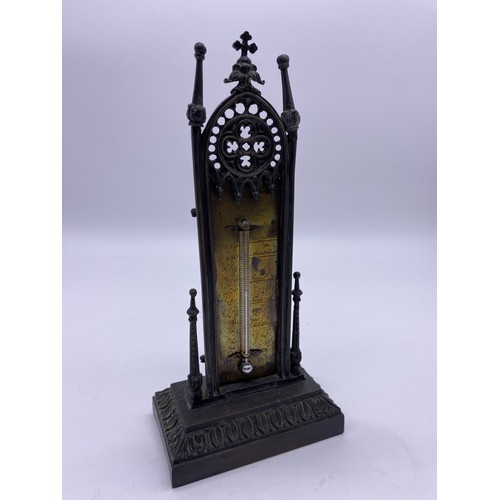 26 - Victorian Gothic revival cast brass table
thermometer, the brass engraved plate held
in tall Gothic ... 