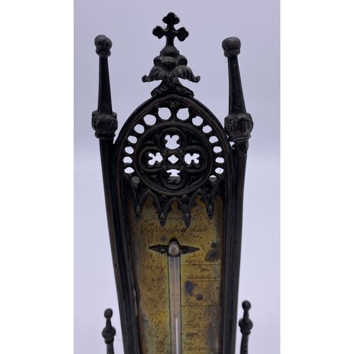 26 - Victorian Gothic revival cast brass table
thermometer, the brass engraved plate held
in tall Gothic ... 