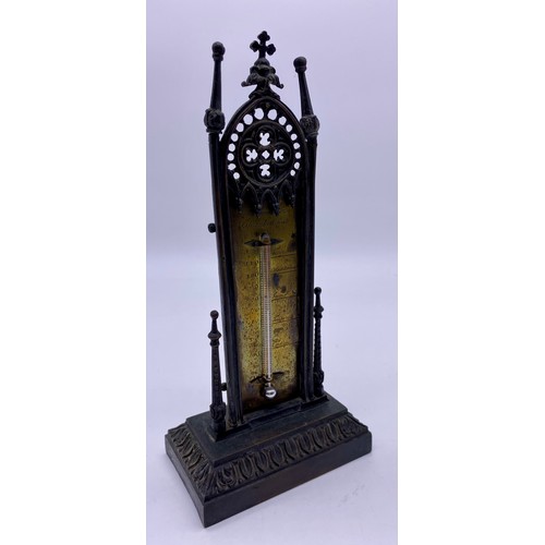 26 - Victorian Gothic revival cast brass table
thermometer, the brass engraved plate held
in tall Gothic ... 