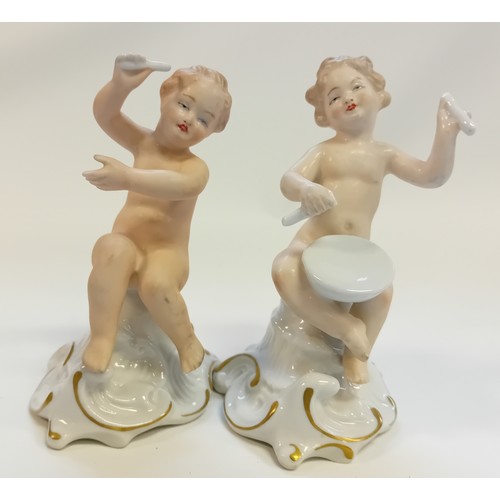 97 - A pair of Wallendorf 1764 Germany figurines ''Boy playing Drum'' and one other. Together with French... 