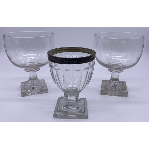 51 - Pair of late Georgian rummer glasses with lemon squeezer bases and an antique glass rummer with whit... 