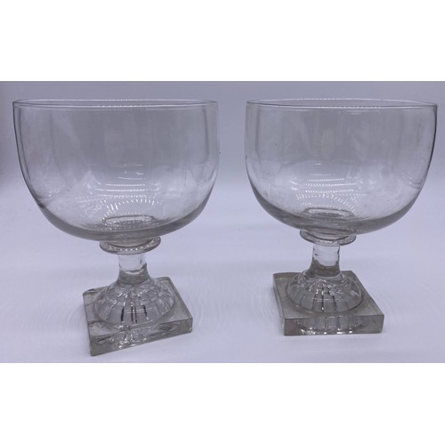 51 - Pair of late Georgian rummer glasses with lemon squeezer bases and an antique glass rummer with whit... 