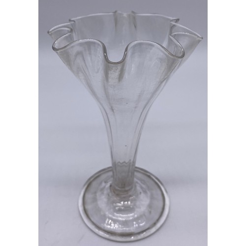 56 - Four pieces of antique glass; 19th century bell shaped wine glass, trumpet wine goblet with air tear... 