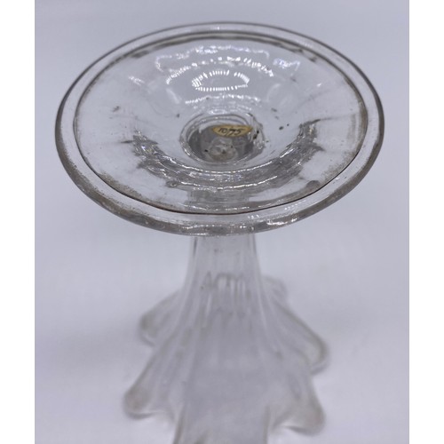 56 - Four pieces of antique glass; 19th century bell shaped wine glass, trumpet wine goblet with air tear... 