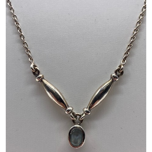 33 - Ladies silver chain and aquamarine stone pendant