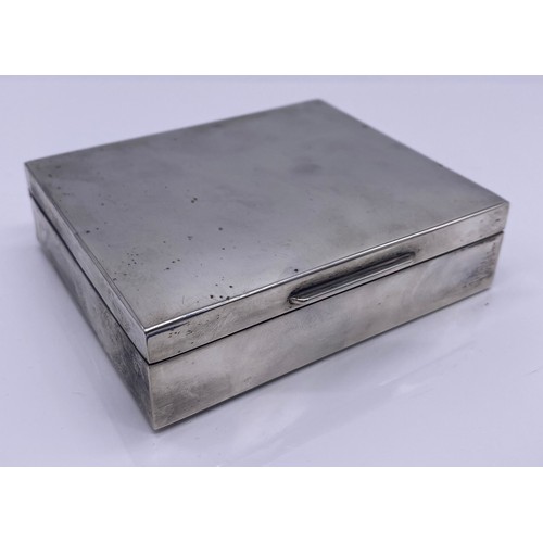 38 - Silver cigarette box fitted with a wooden interior
S J Rose & Son, London 
263g