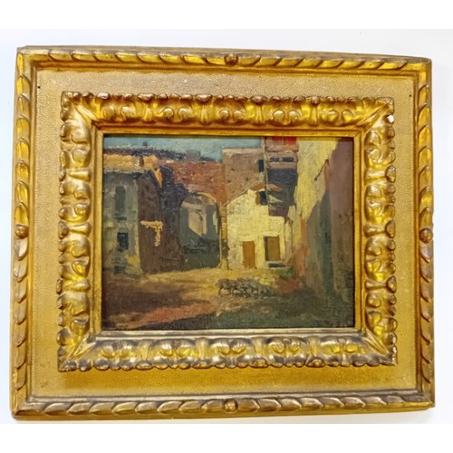 101 - 19th Century oil on canvas 'Village street', unsigned and dated 1863 to the back.
[40x48cm]