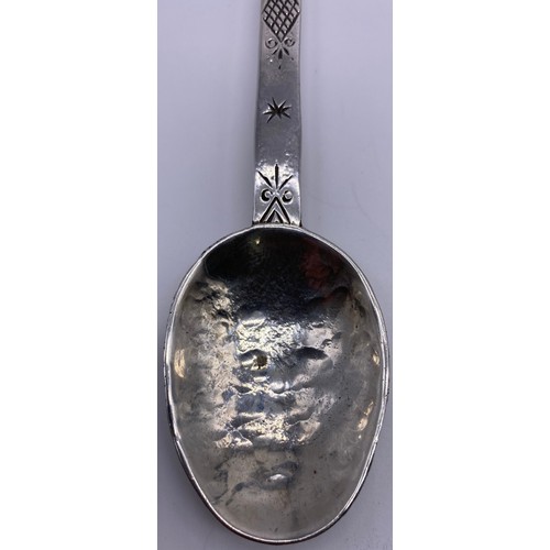 70 - An Arts and crafts preserve spoon Amy Sandheim, London 1923, long stem with grape terminal star and ... 