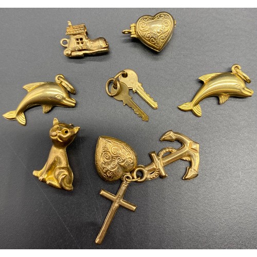 30A - Nine 9ct Gold Charms [12.2g]