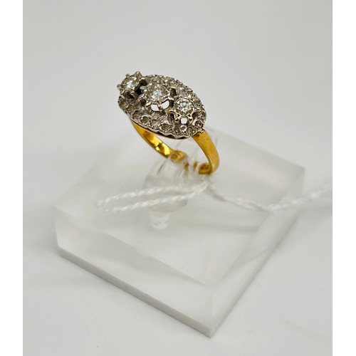 6 - 18ct yellow gold ladies ring, three centre larger diamonds surrounding by small diamonds comes with ... 