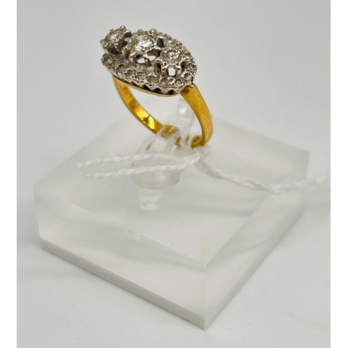 6 - 18ct yellow gold ladies ring, three centre larger diamonds surrounding by small diamonds comes with ... 