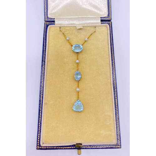 3 - An Edwardian aquamarine and pearl necklace 
The trace link chain with seed pearl spacers to a centra... 