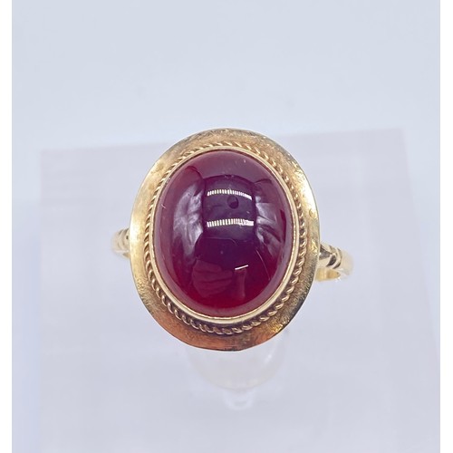 1 - 9ct gold ladies ring, oval cut cabochon garnet
Size:N
Weight:3.05g