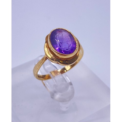 12 - 9ct gold ladies ring, oval cut amethyst stone 
Size:M
Weight:2.48g