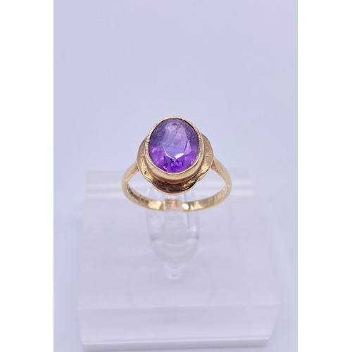 12 - 9ct gold ladies ring, oval cut amethyst stone 
Size:M
Weight:2.48g